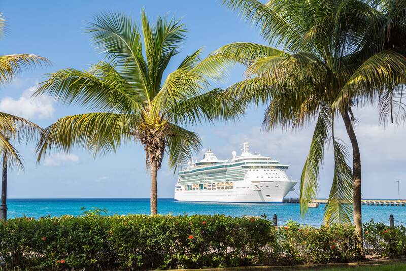 Cruise ship at tropical island port 